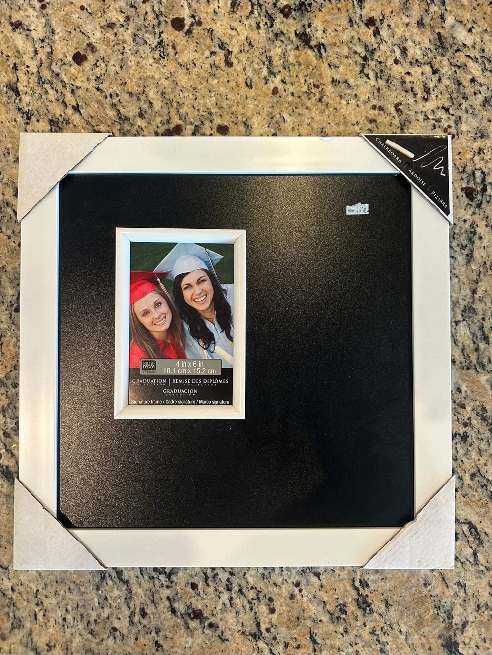 Photo frame with blackboard for messages.